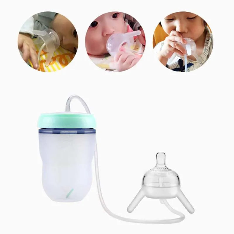 Biberon 🍼 auto-alimenté équipé d'une longue paille.