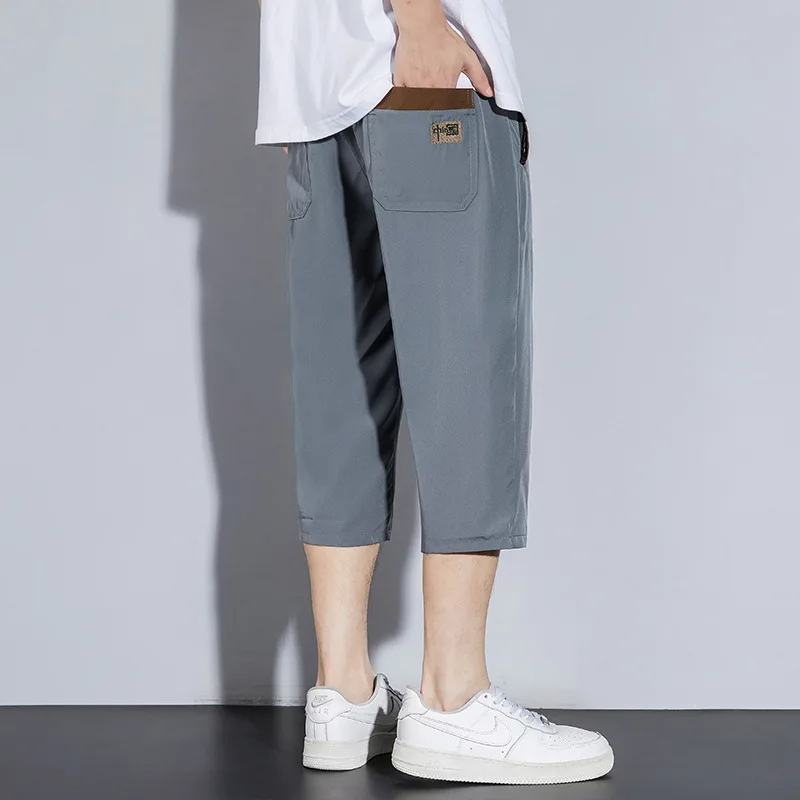 Pantalons en soie glacée pour hommes et femmes.